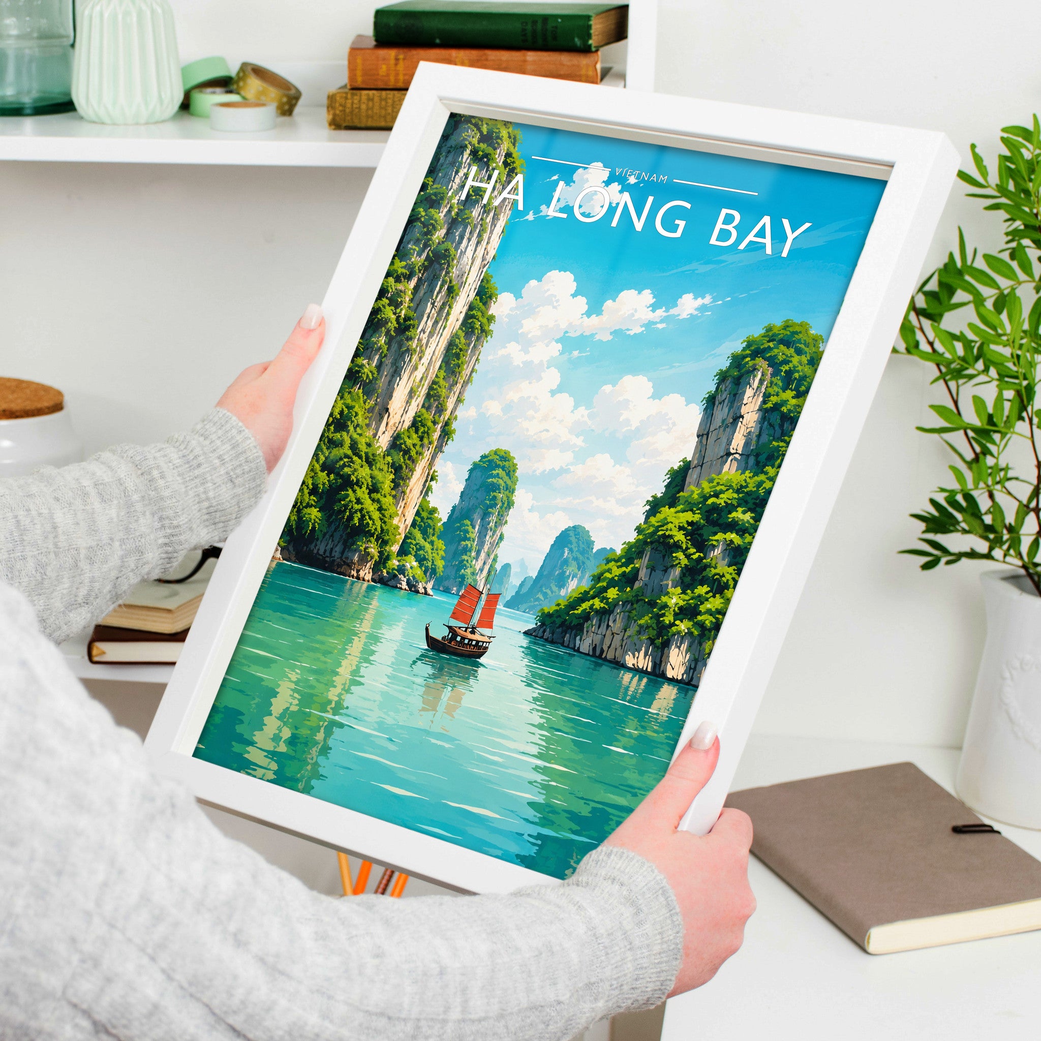Ha Long Bay Travel Poster in a white frame, held to show scale