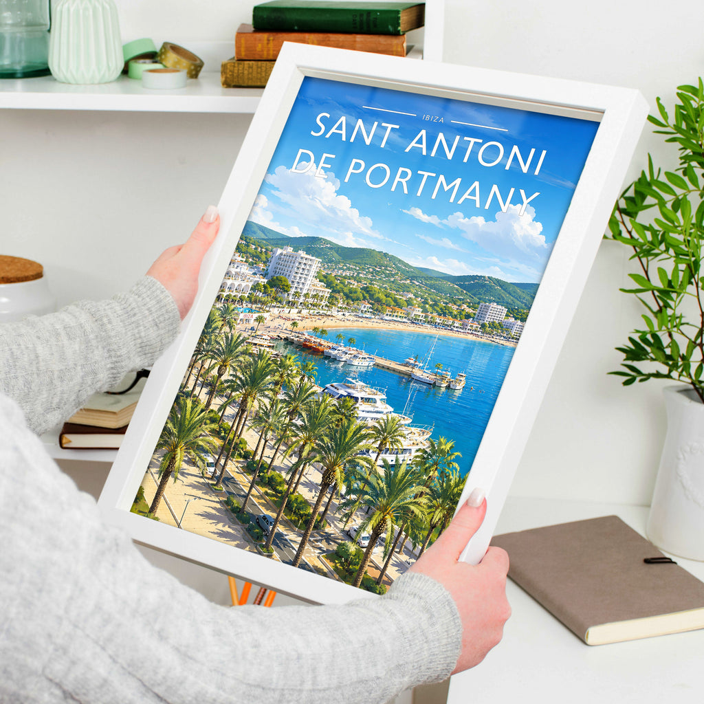 Sant Antoni de Portmany Travel Poster in a white frame, held to show scale