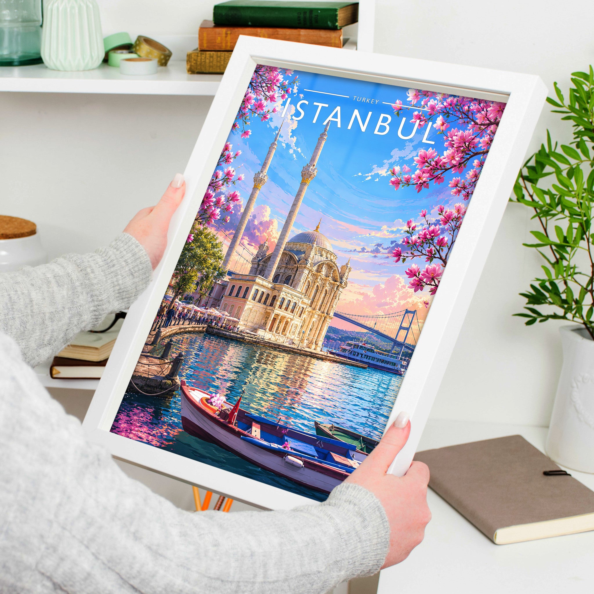 Istanbul #2 Travel Poster in a white frame, held to show scale