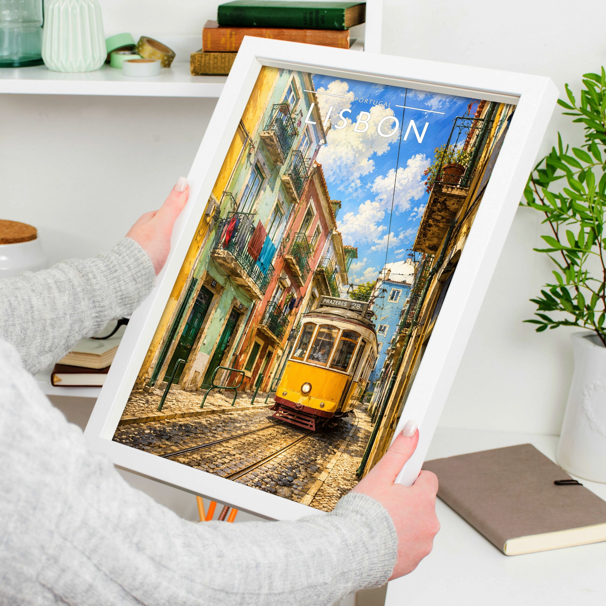 Lisbon #2 Travel Poster in a white frame, held to show scale