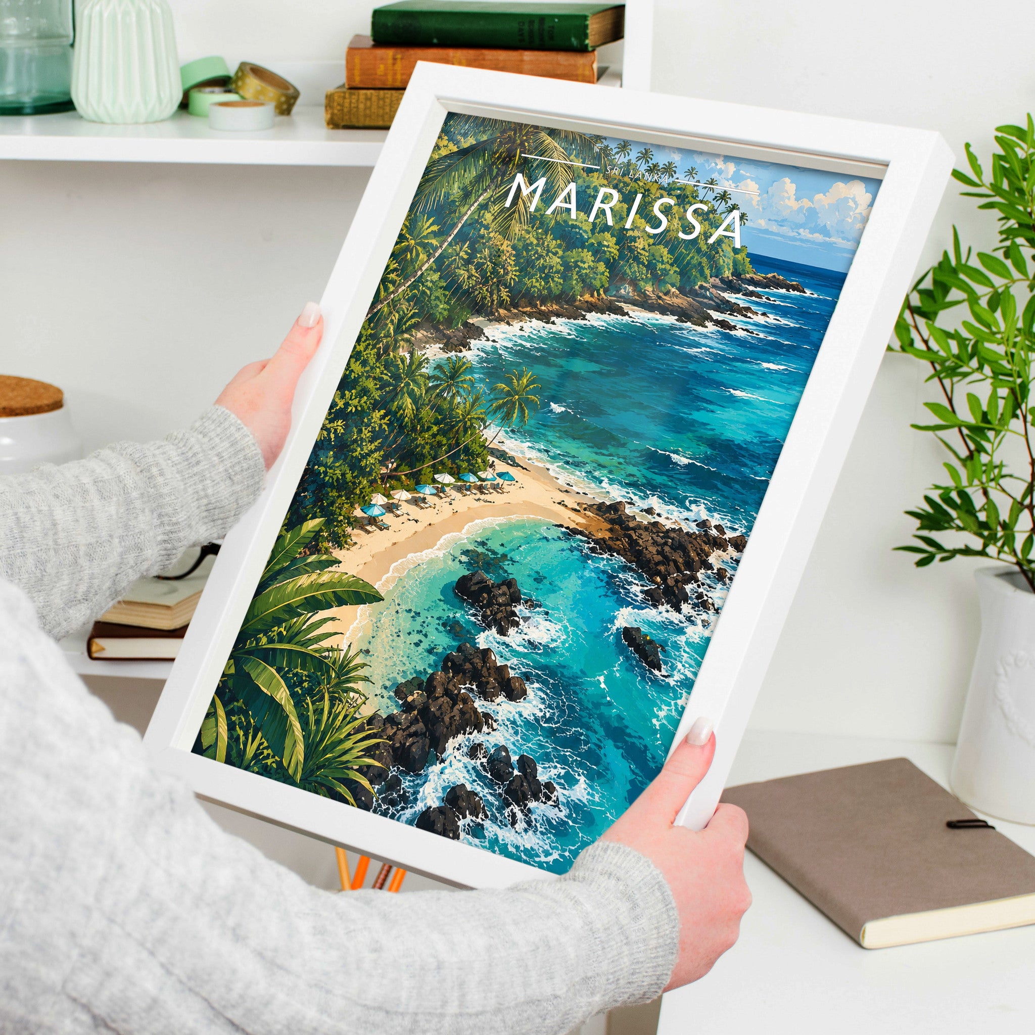 Marissa Travel Poster in a white frame, held to show scale