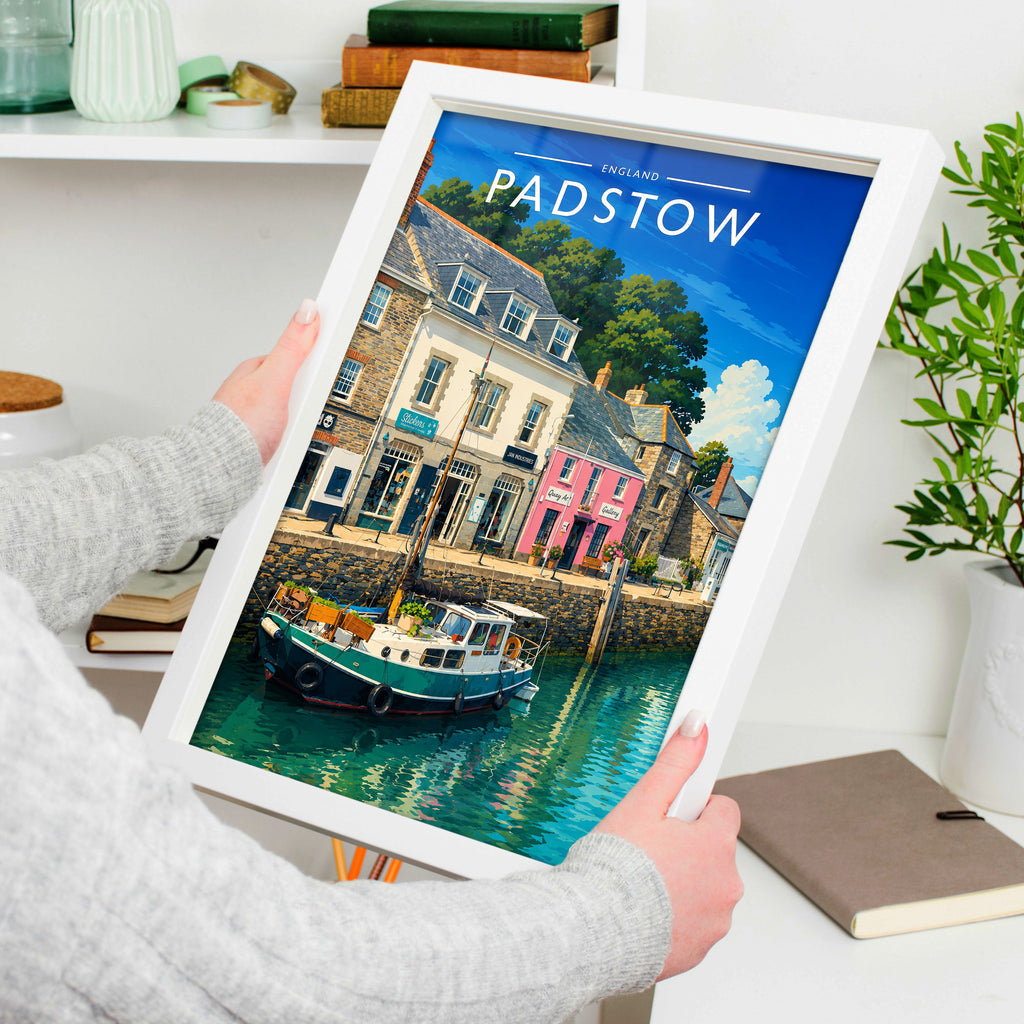 Padstow #2 Travel Poster in a white frame, held to show scale