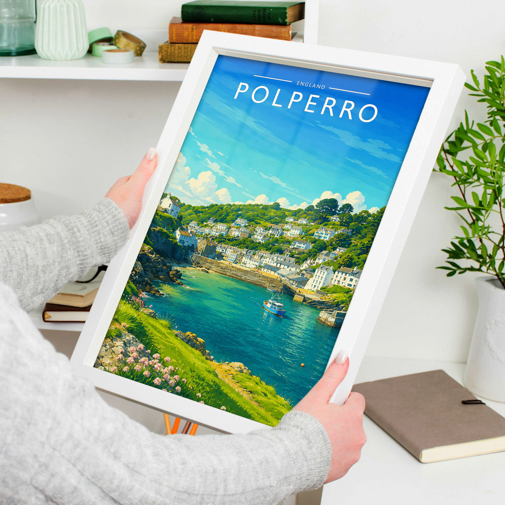 Polperro #2 Travel Poster in a white frame, held to show scale
