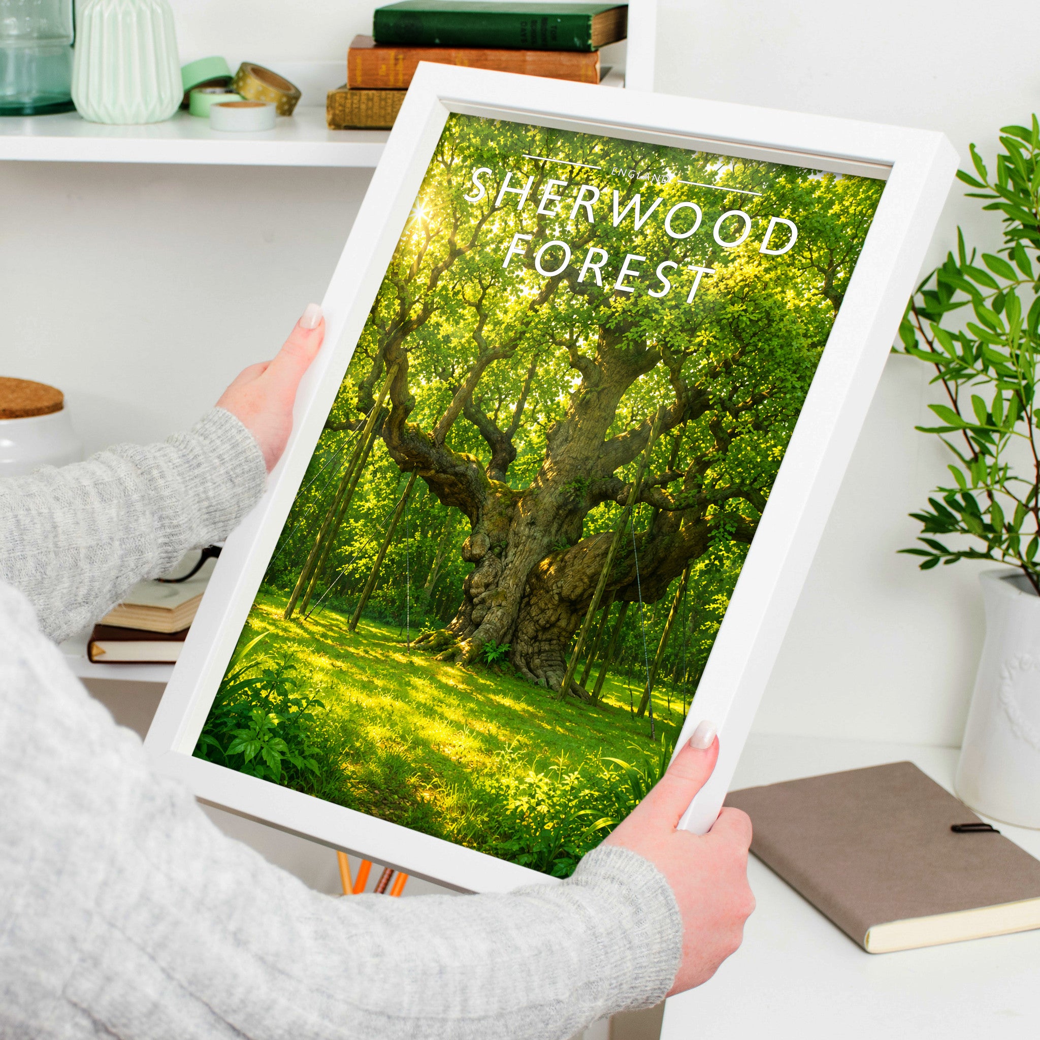 Sherwood Forest Travel Poster in a white frame, held to show scale