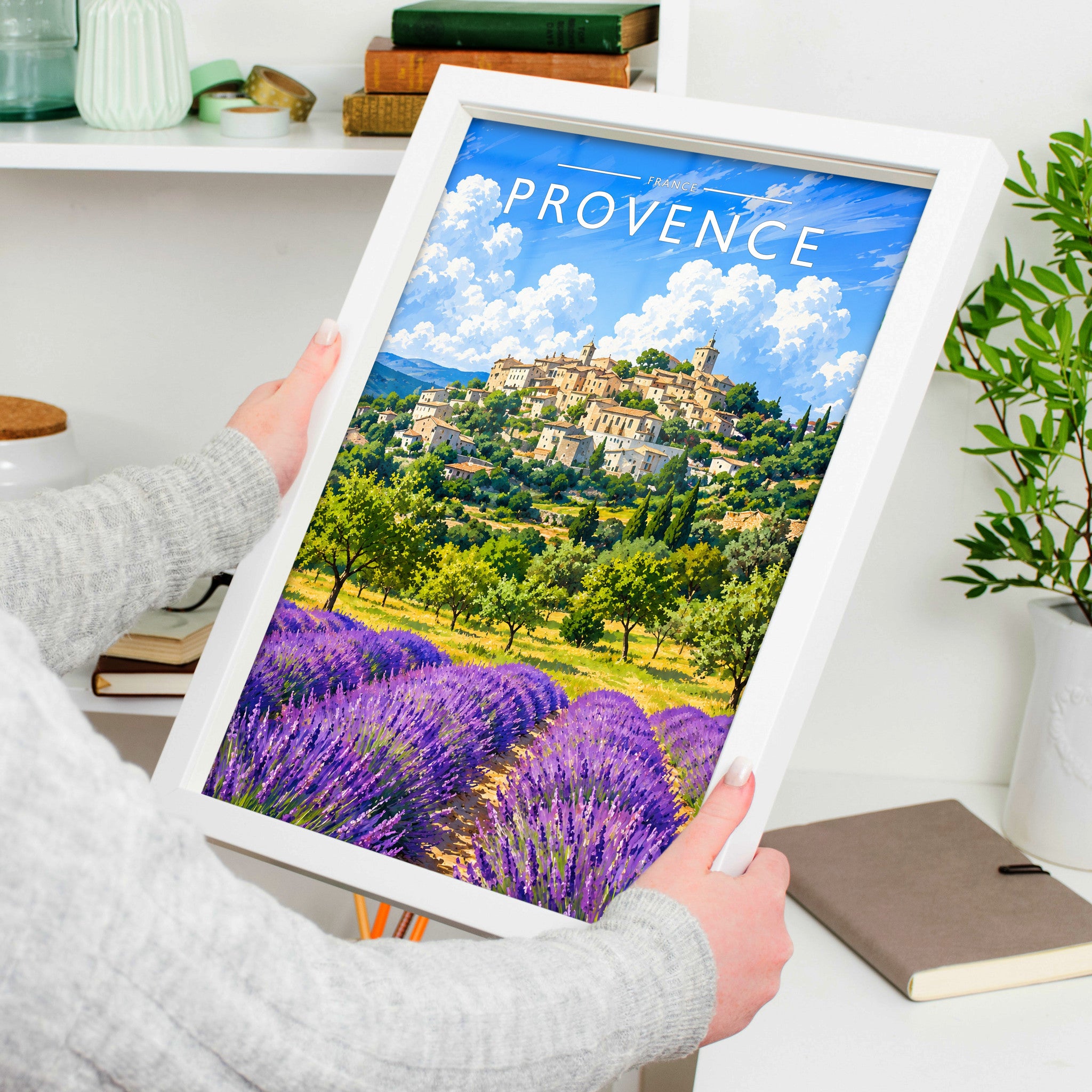 Provence Travel Poster in a white frame, held to show scale