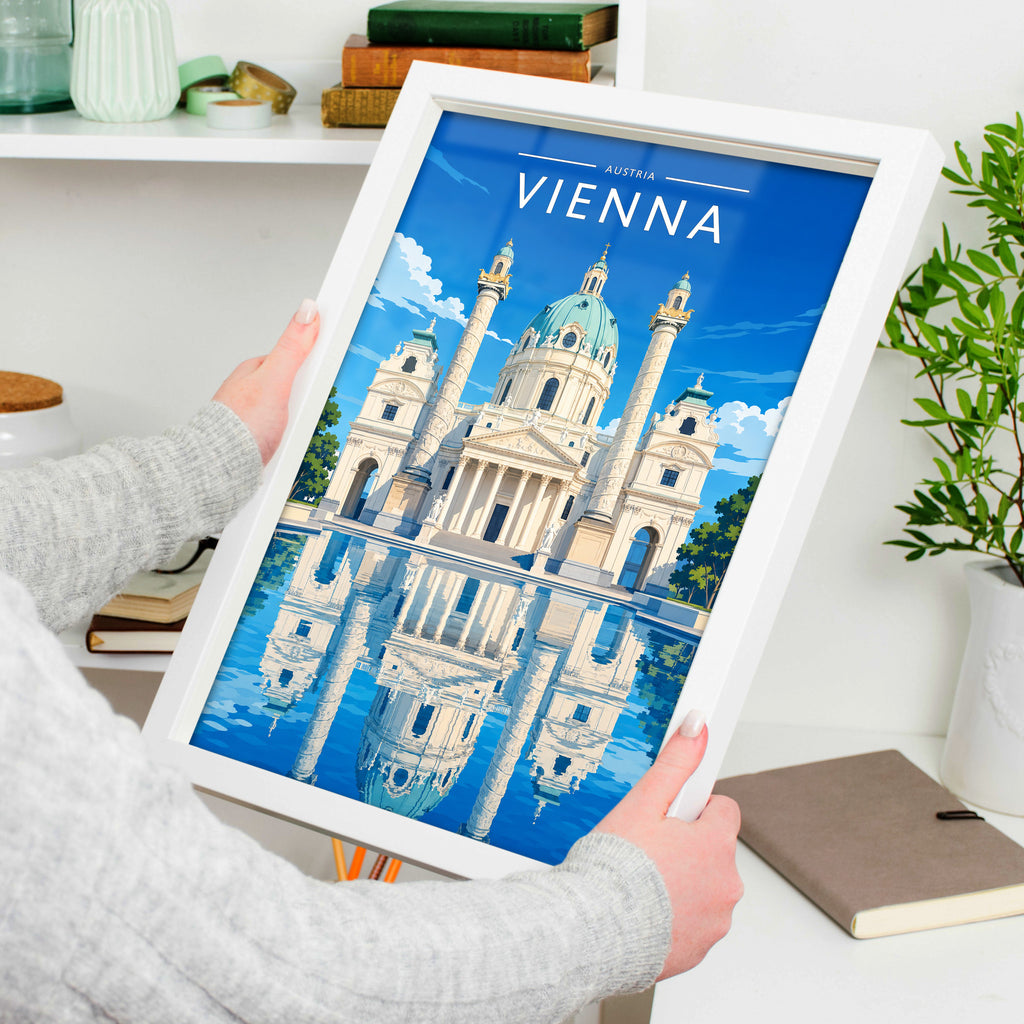 Vienna #2 Travel Poster in a white frame, held to show scale