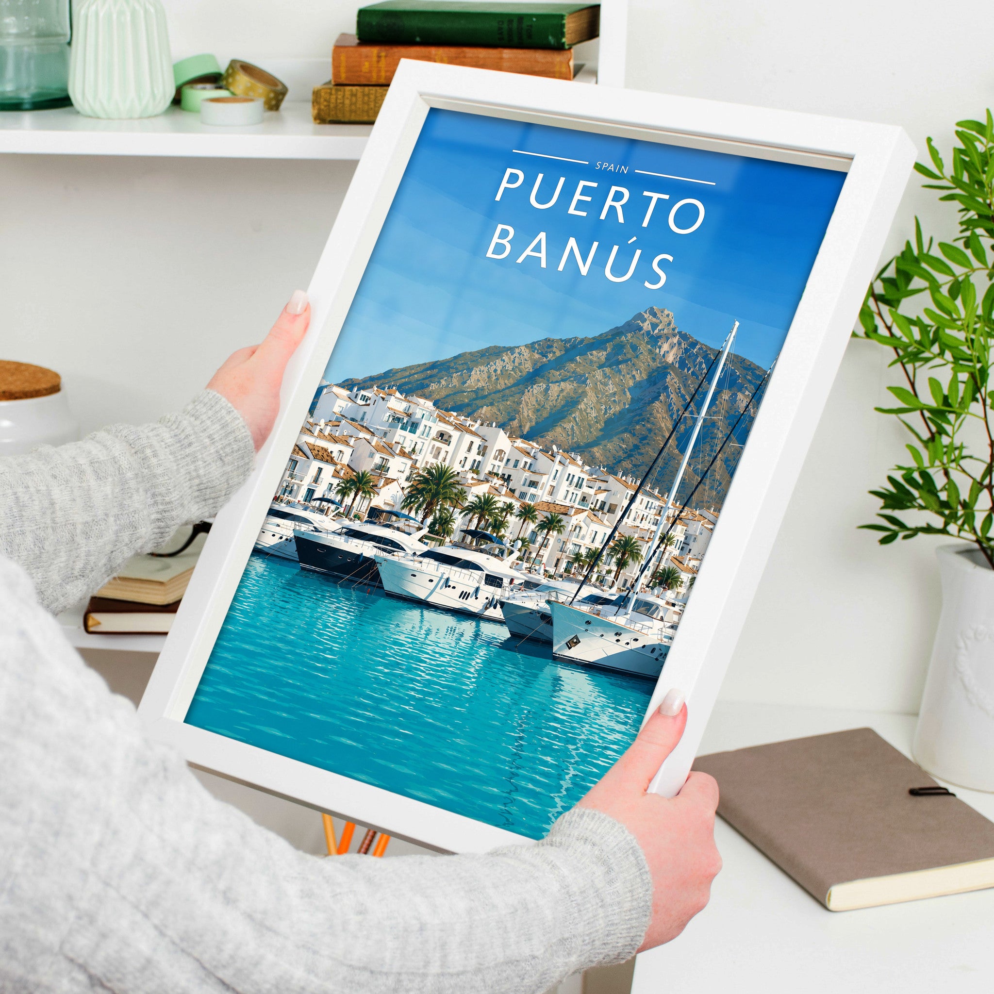 Puerto Banús #2 Travel Poster in a white frame, held to show scale