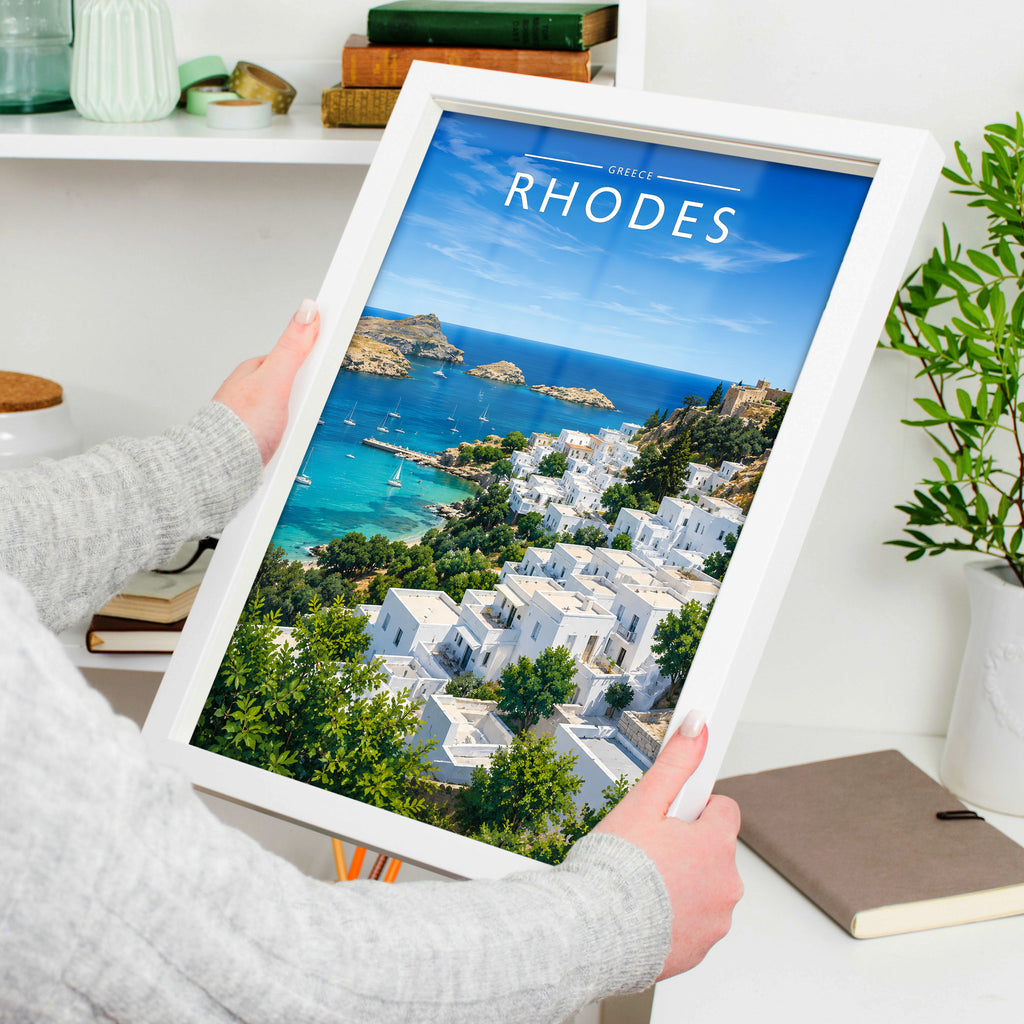Rhodes #3 Travel Poster in a white frame, held to show scale