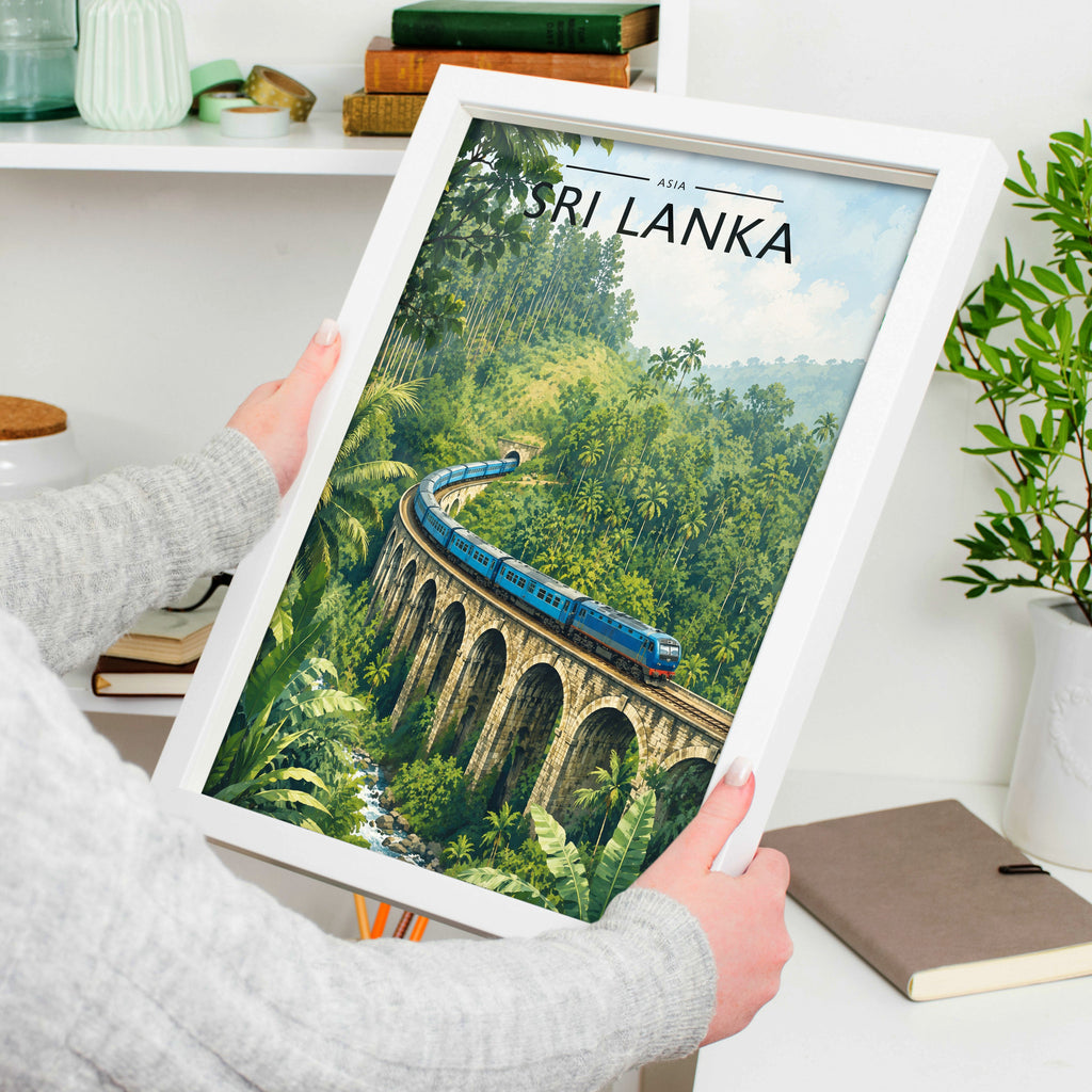 Sri Lanka Travel Poster in a white frame, held to show scale