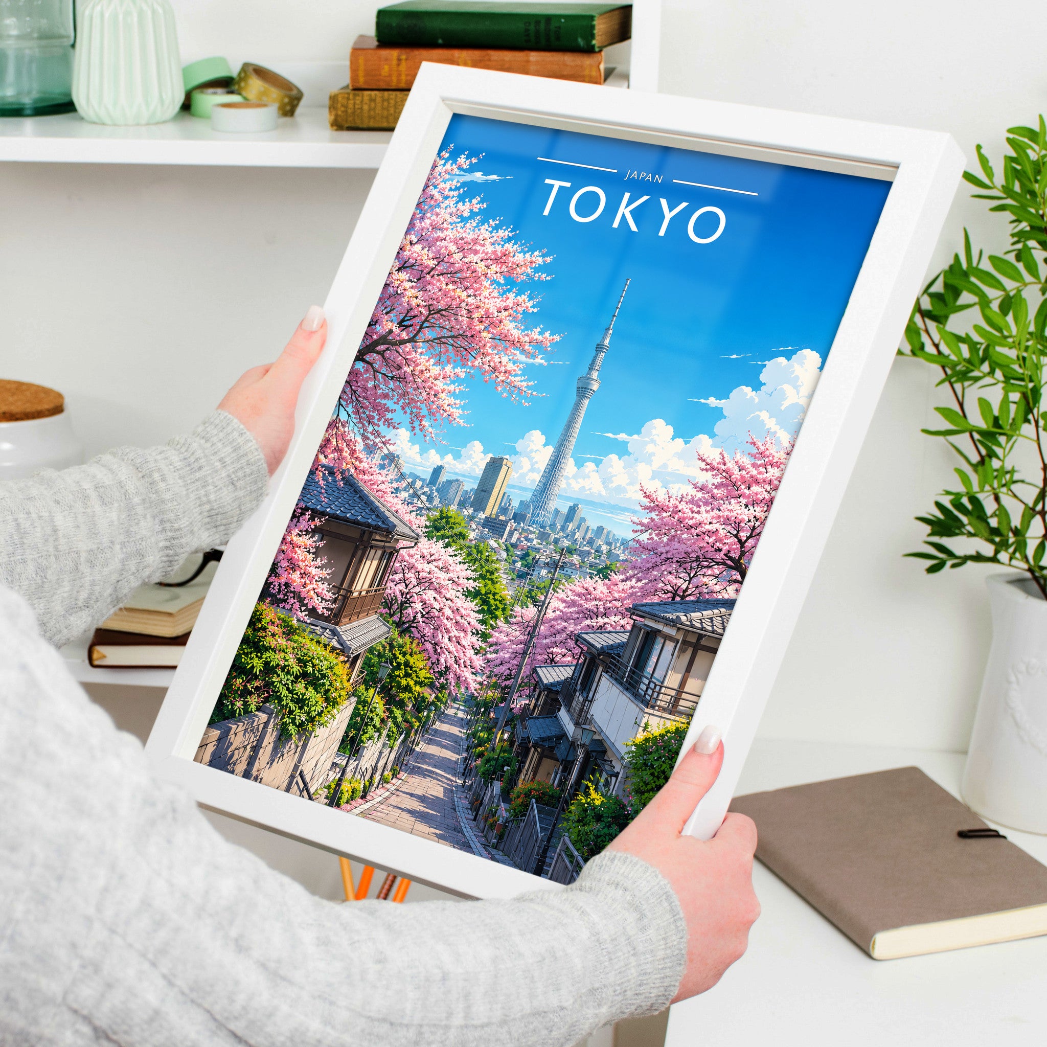 Tokyo #3 Travel Poster in a white frame, held to show scale