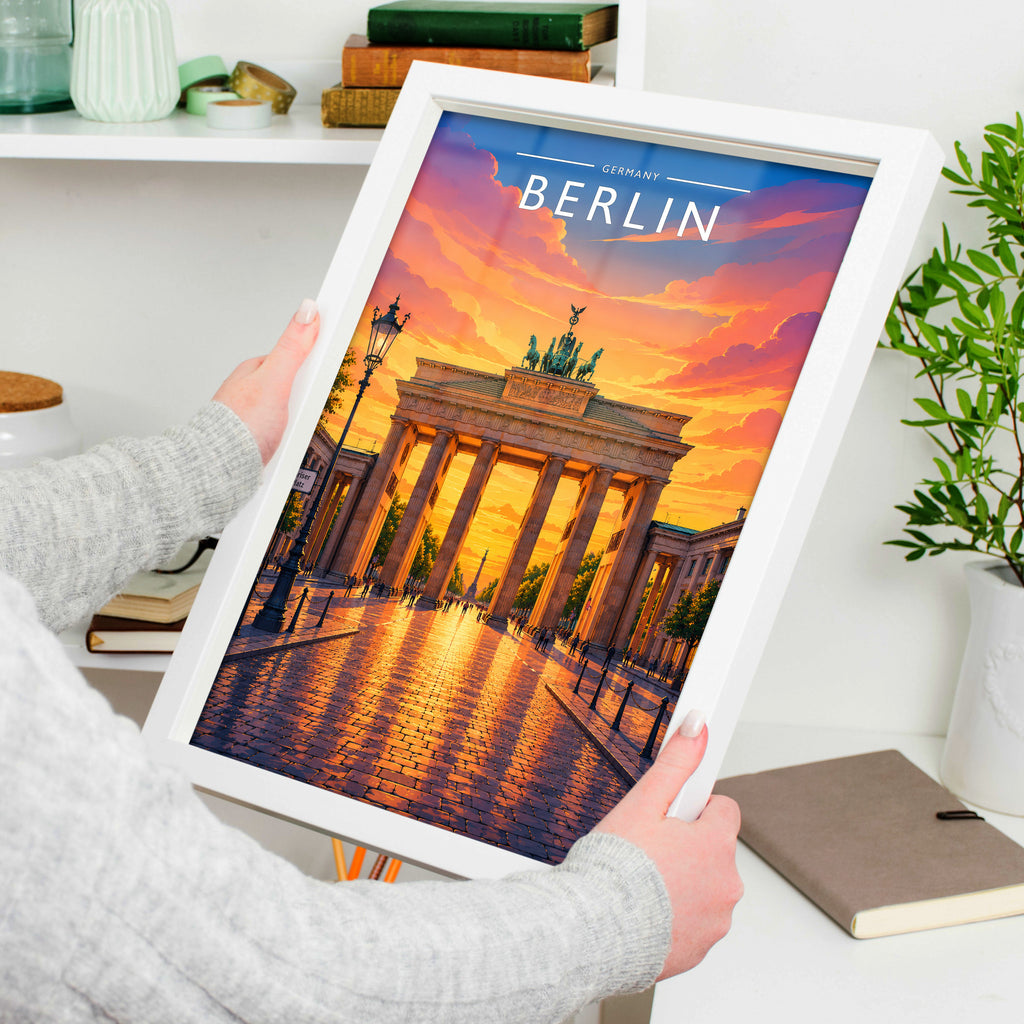 Berlin Travel Poster in a white frame, held to show scale