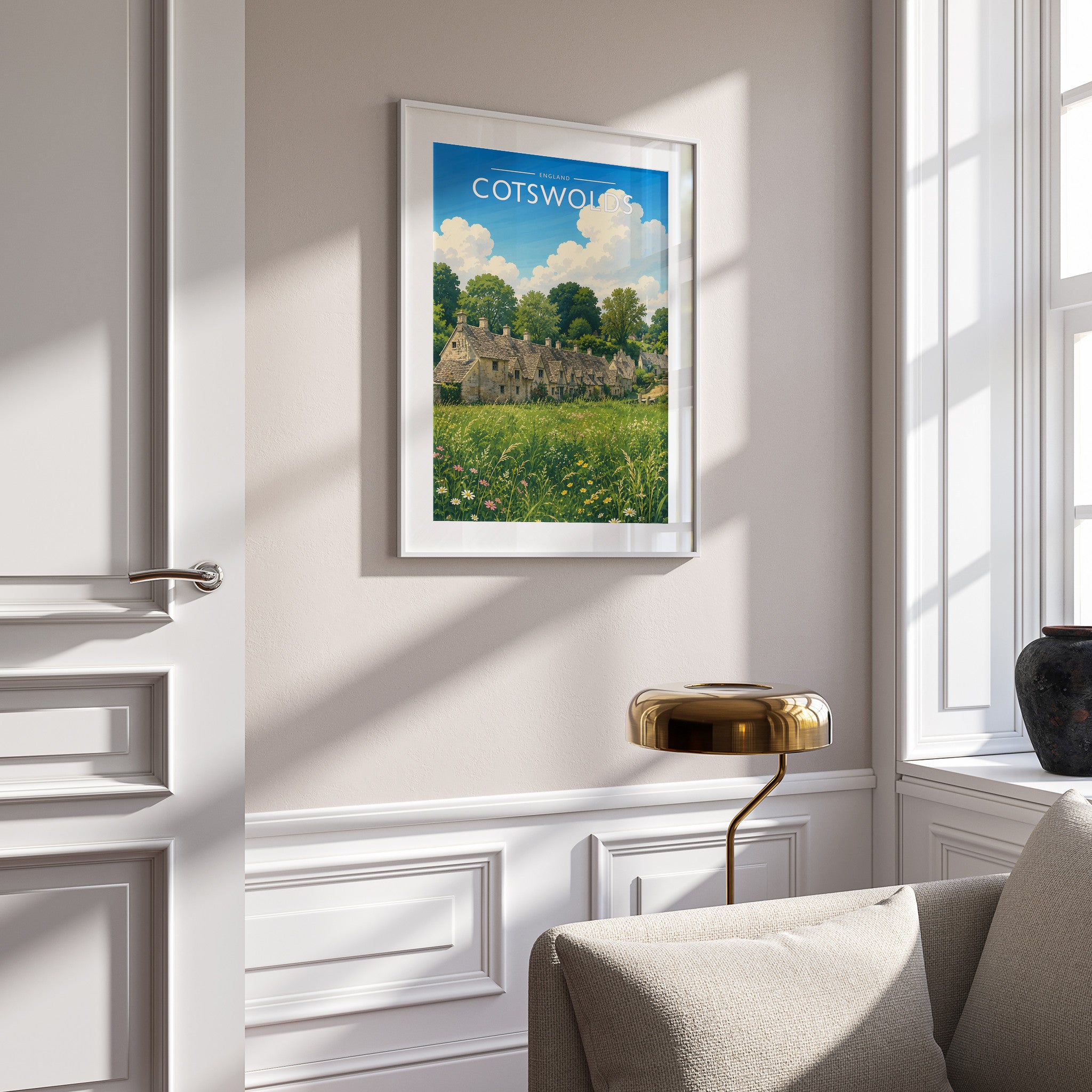 Cotswolds Travel Poster in a white frame on a panelled wall