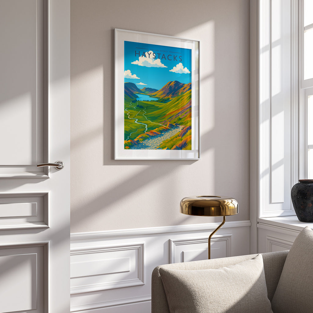 Haystacks Travel Poster in a white frame on a panelled wall