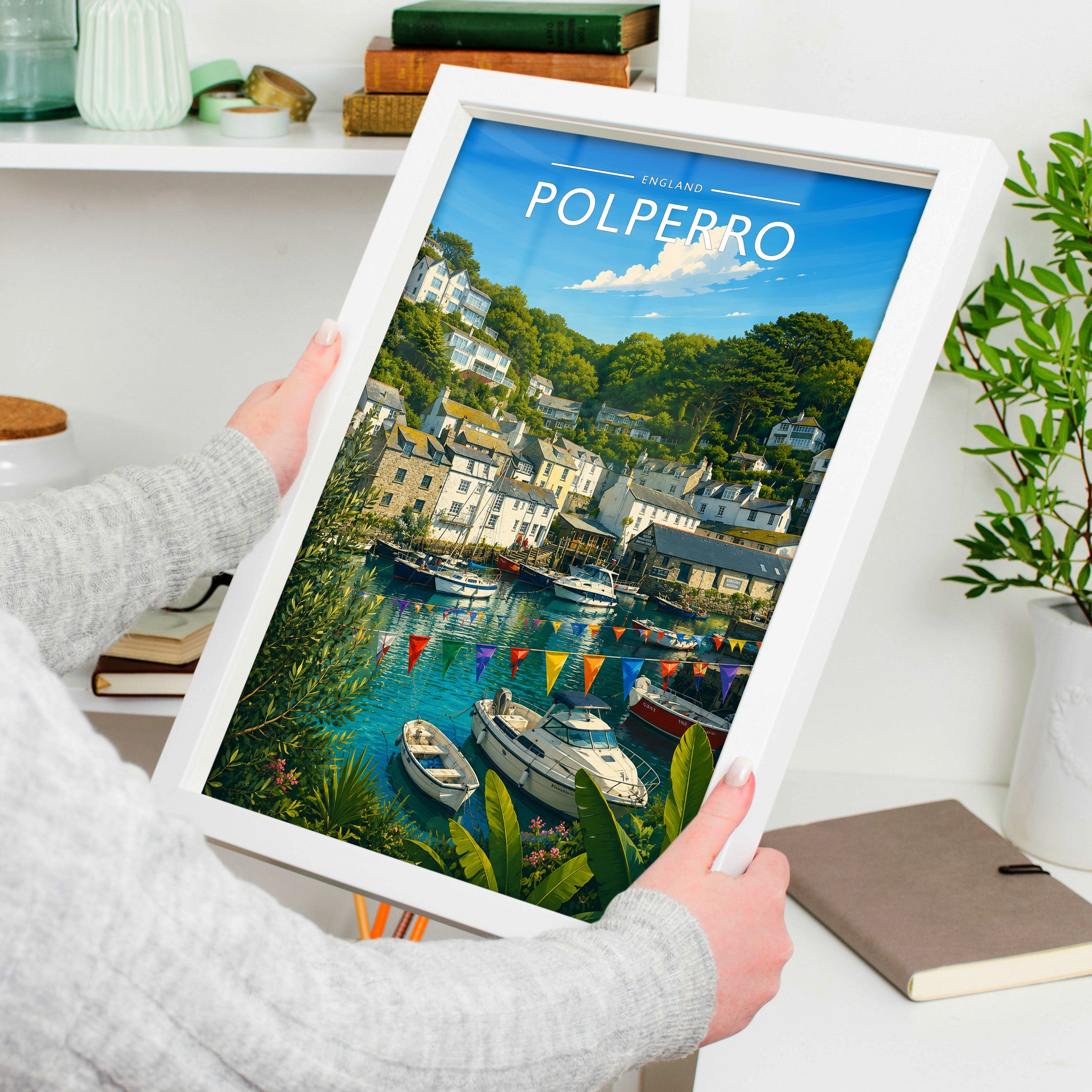 Polperro #4 Travel Poster in a white frame, held to show scale
