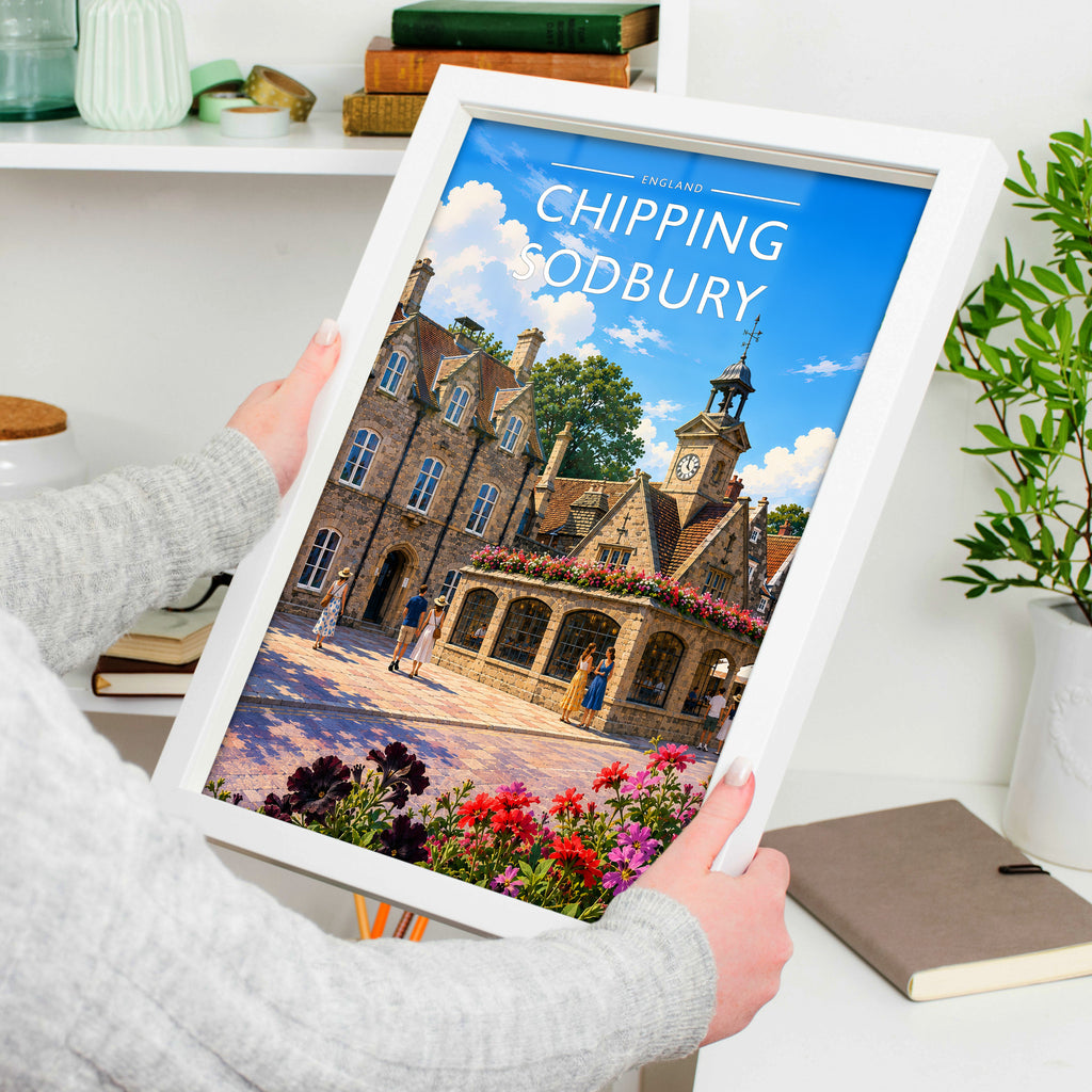 Chipping Sodbury Travel Poster in a white frame, held to show scale