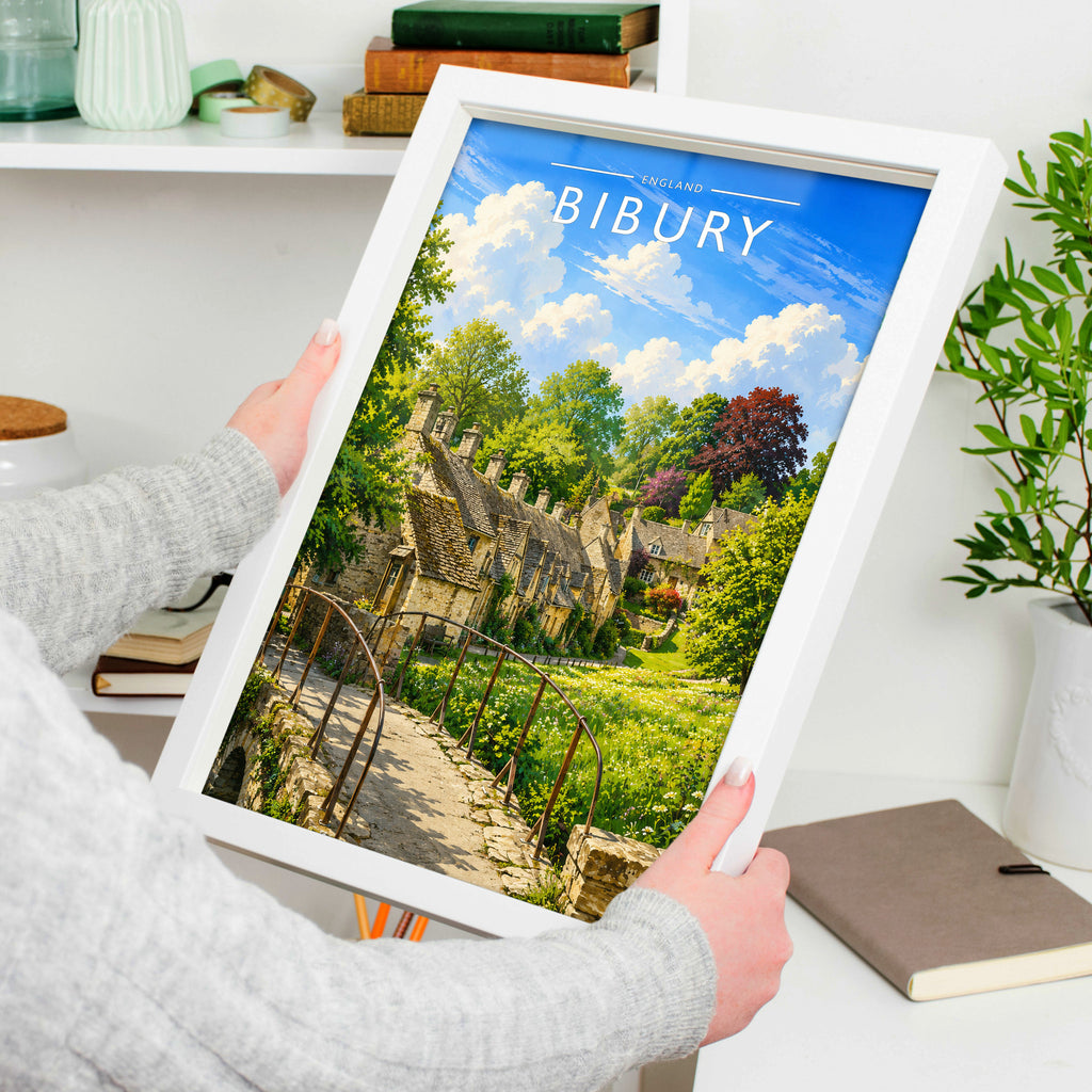 Bibury Travel Poster in a white frame, held to show scale