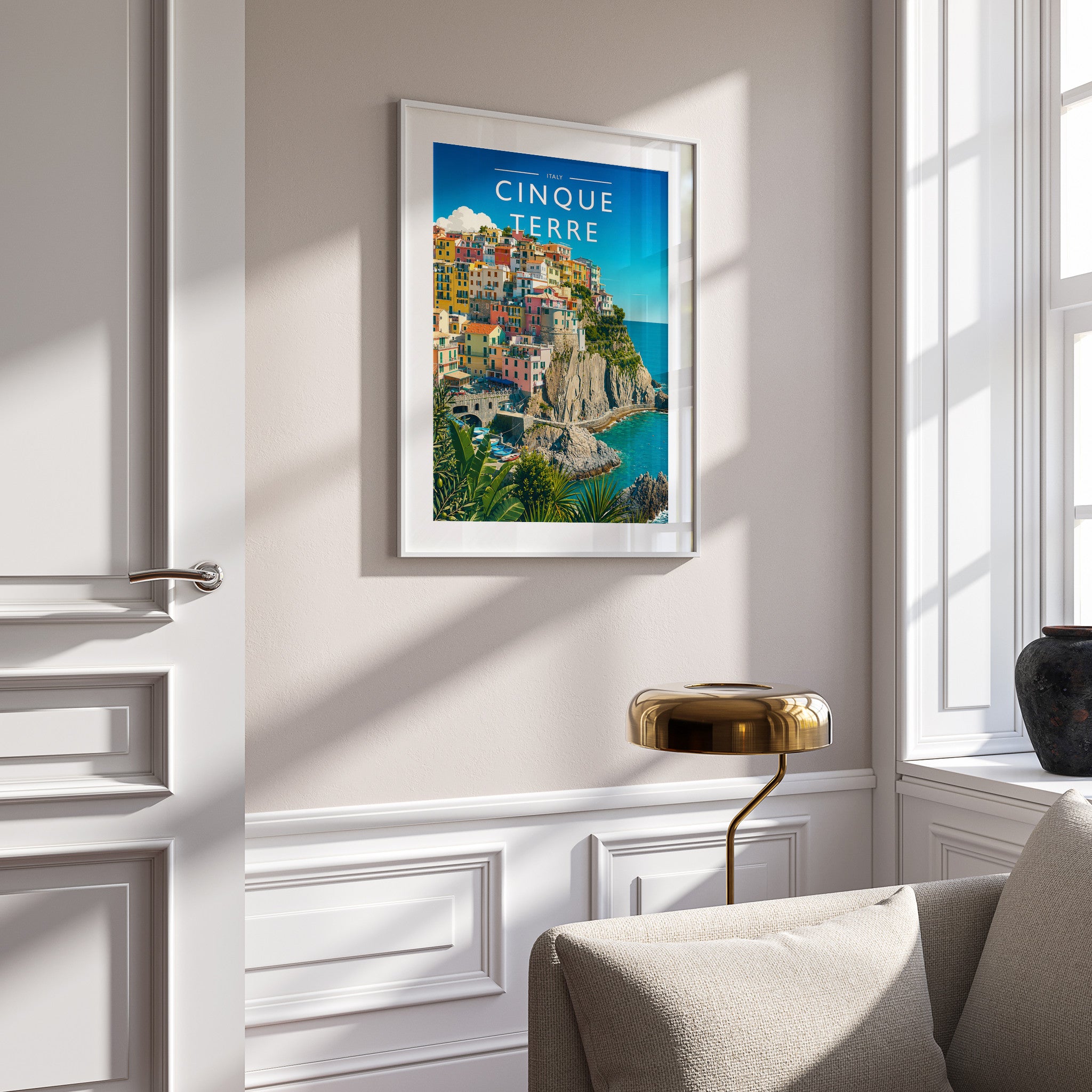 Cinque Terre Travel Poster in a white frame on a panelled wall
