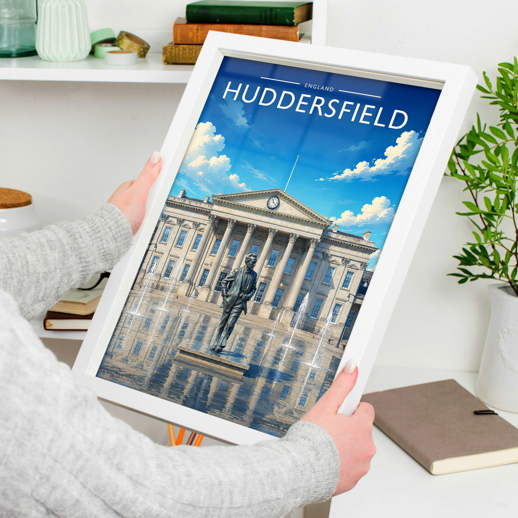 Huddersfield Travel Poster in a white frame, held to show scale