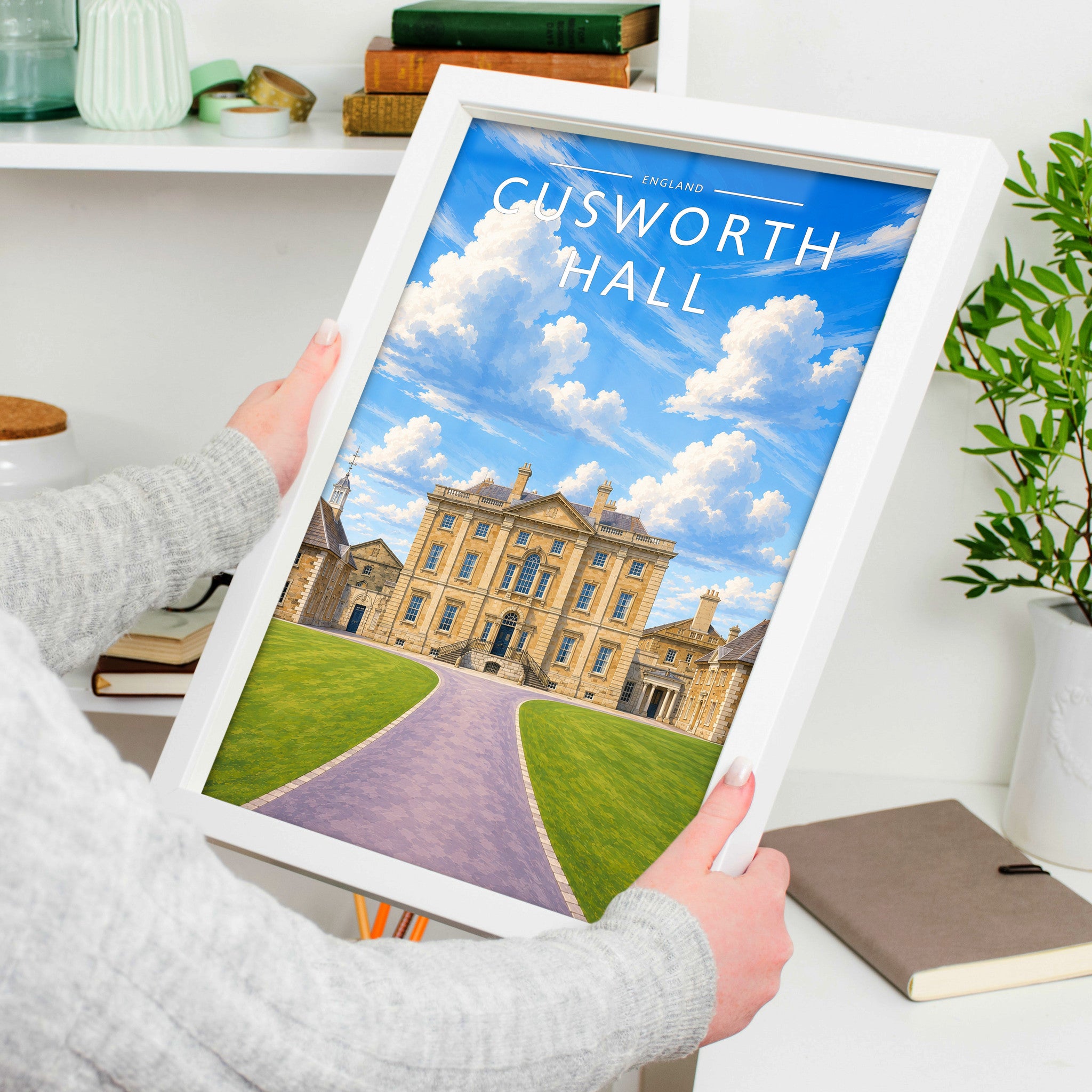 Cusworth Hall Travel Poster in a white frame, held to show scale