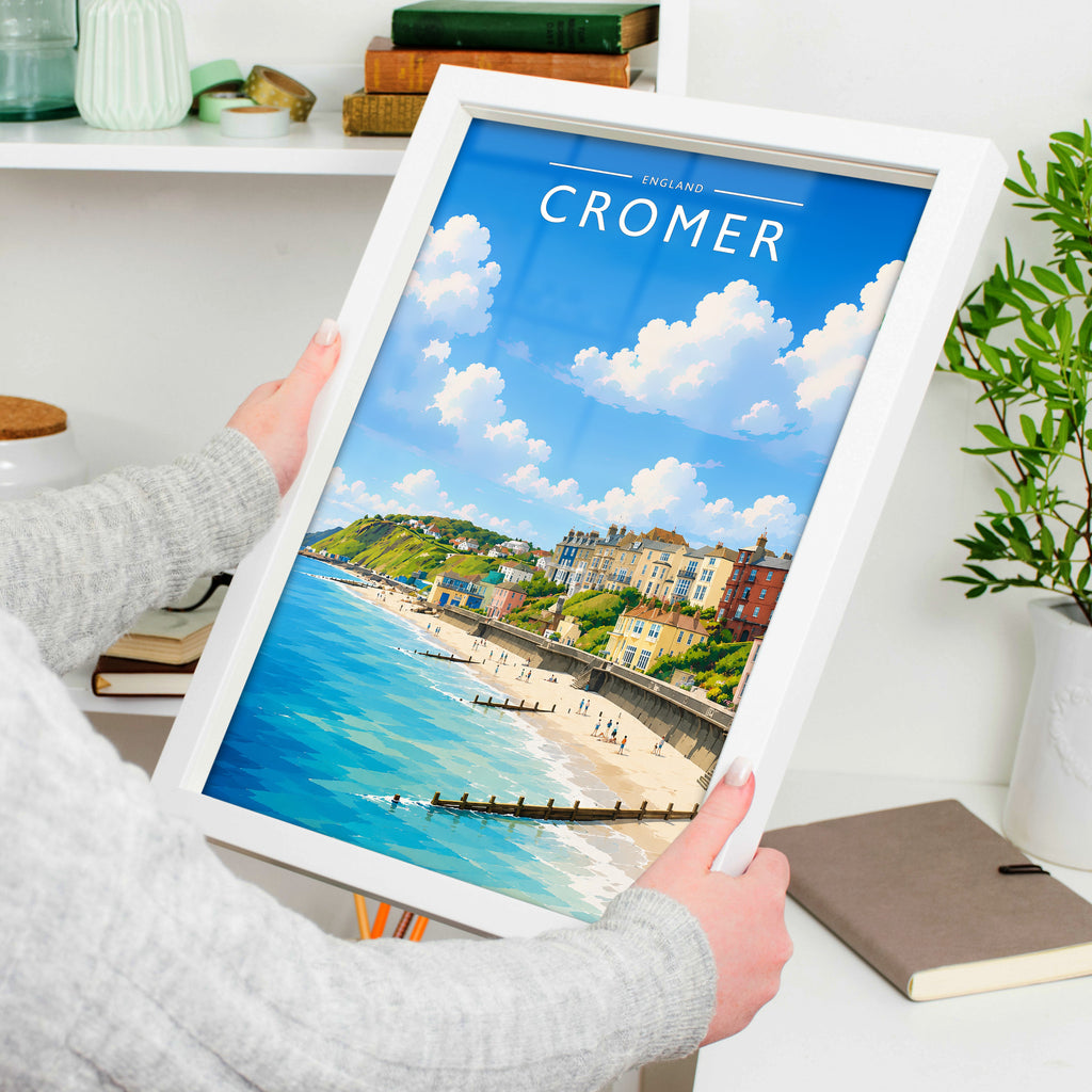 Cromer #3 Travel Poster in a white frame, held to show scale