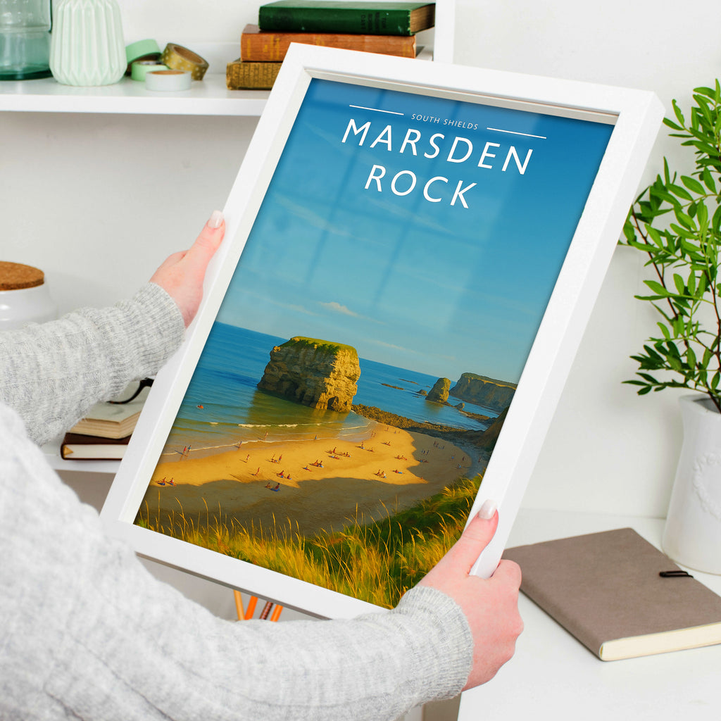South Shields Travel Poster in a white frame, held to show scale