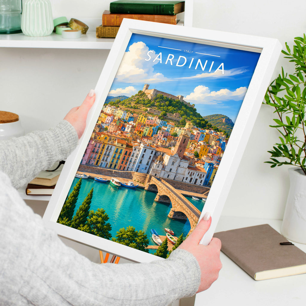 Sardinia Travel Poster in a white frame, held to show scale
