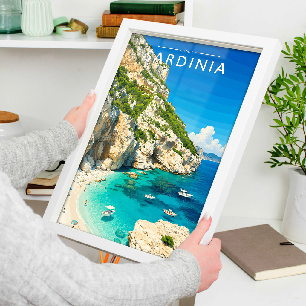 Sardinia #2 Travel Poster in a white frame, held to show scale