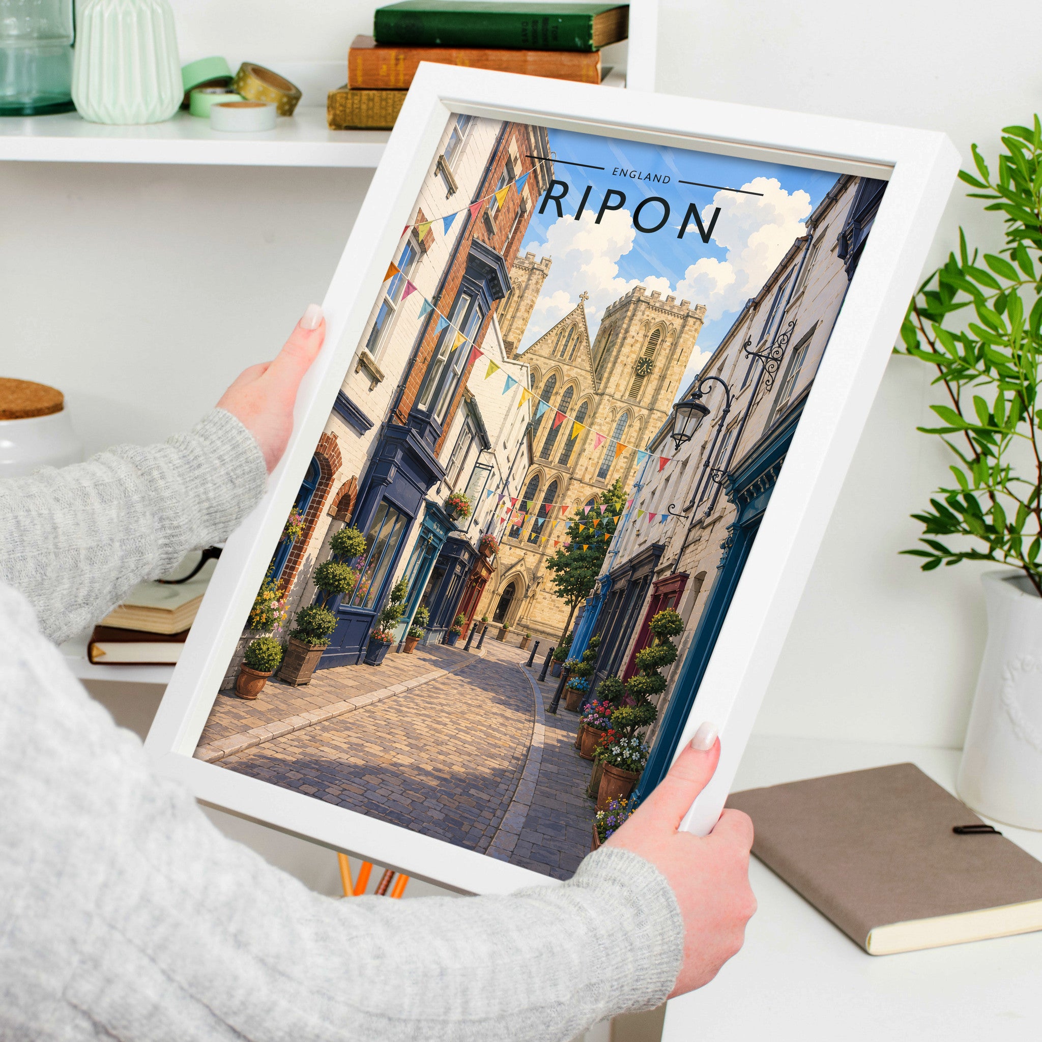 Ripon Travel Poster in a white frame, held to show scale