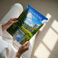 Fountains Abbey Travel Poster - A4 print held in hand