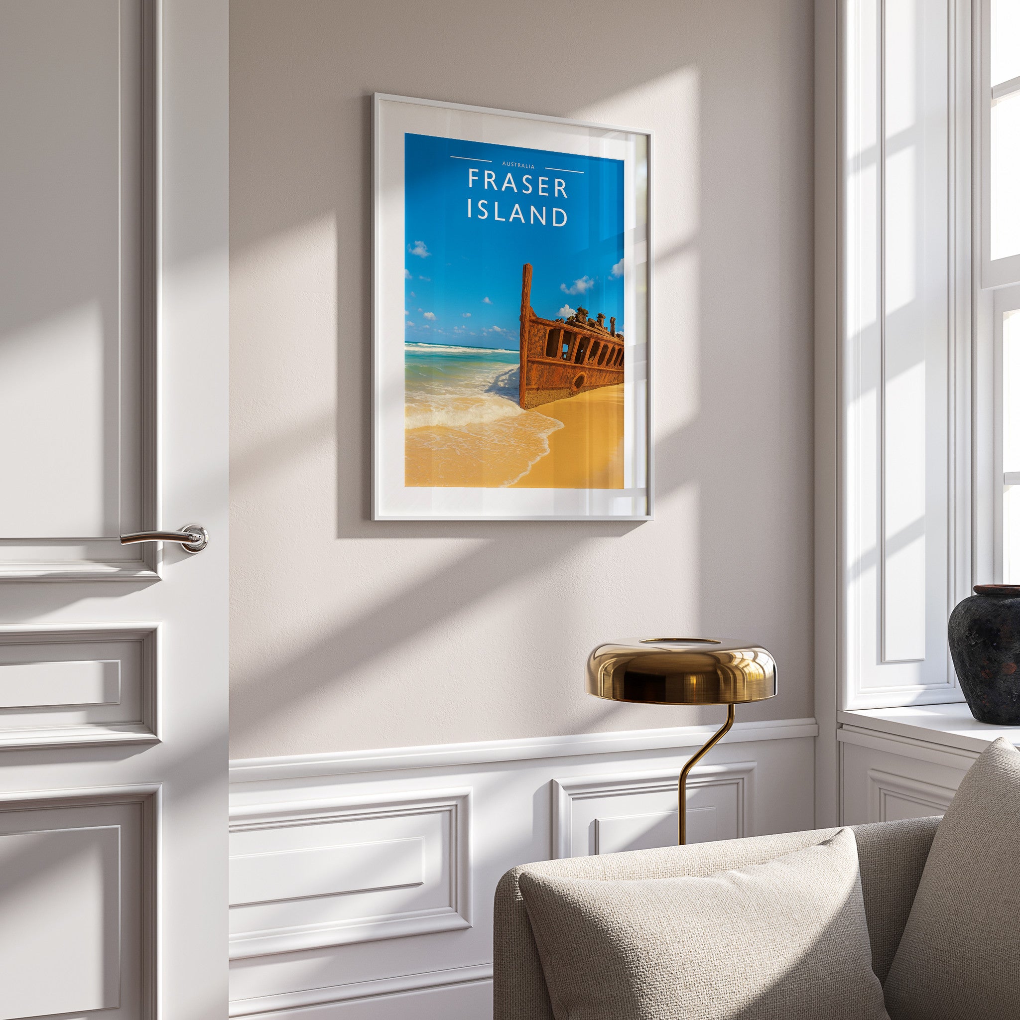 Fraser Island Travel Poster in a white frame on a panelled wall