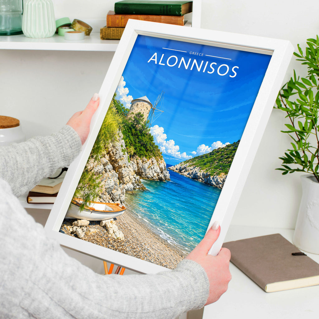 Alonnisos Travel Poster in a white frame, held to show scale