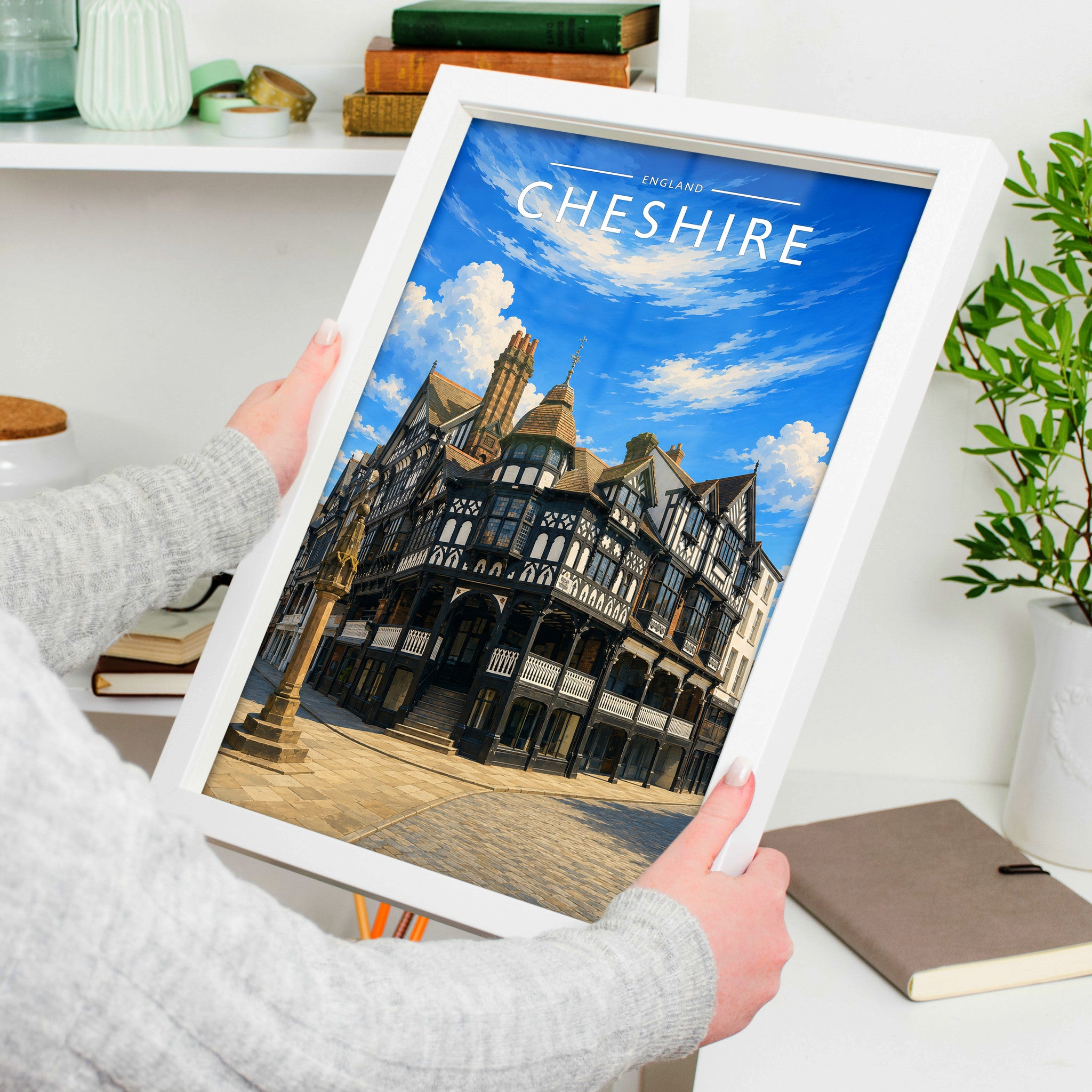 Cheshire #2 Travel Poster in a white frame, held to show scale