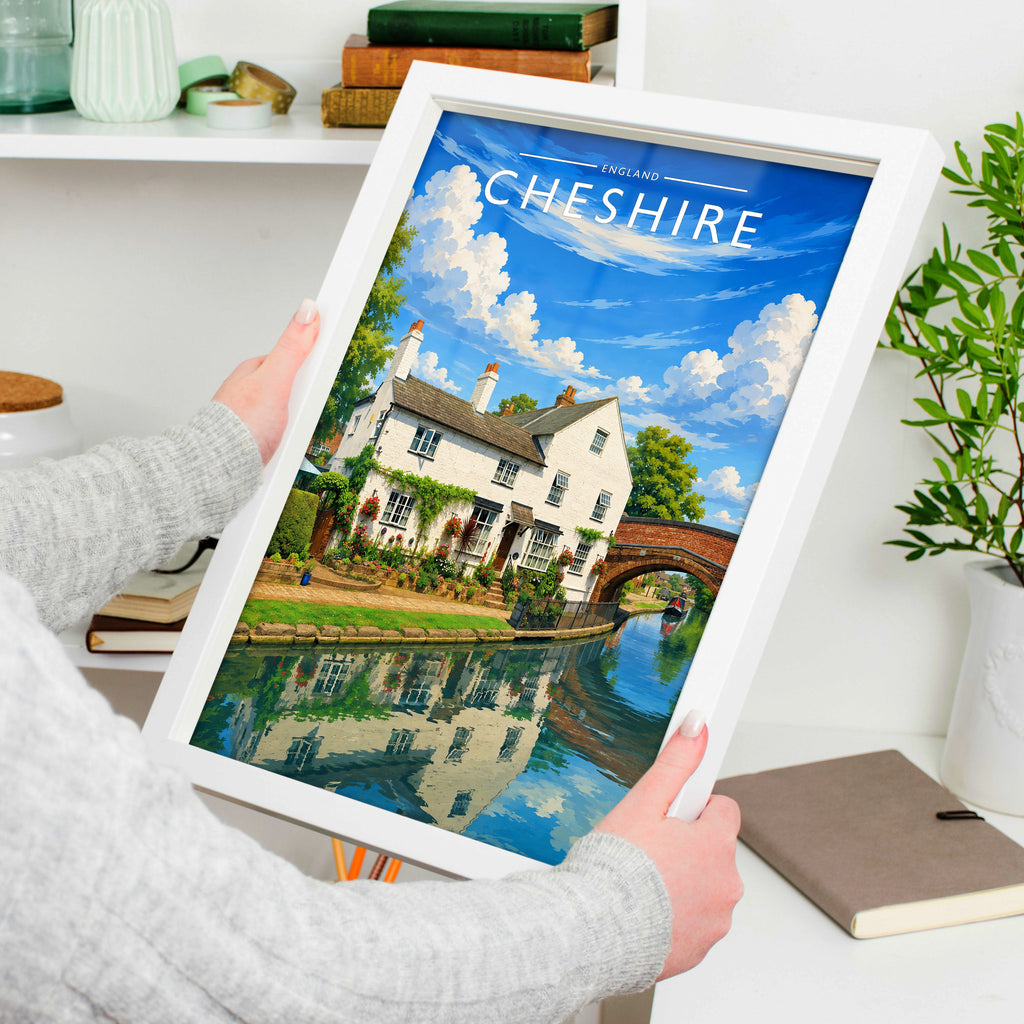 Cheshire #4 Travel Poster in a white frame, held to show scale