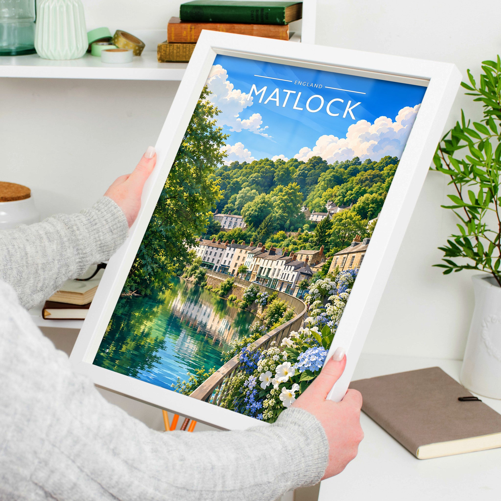 Matlock Travel Poster in a white frame, held to show scale