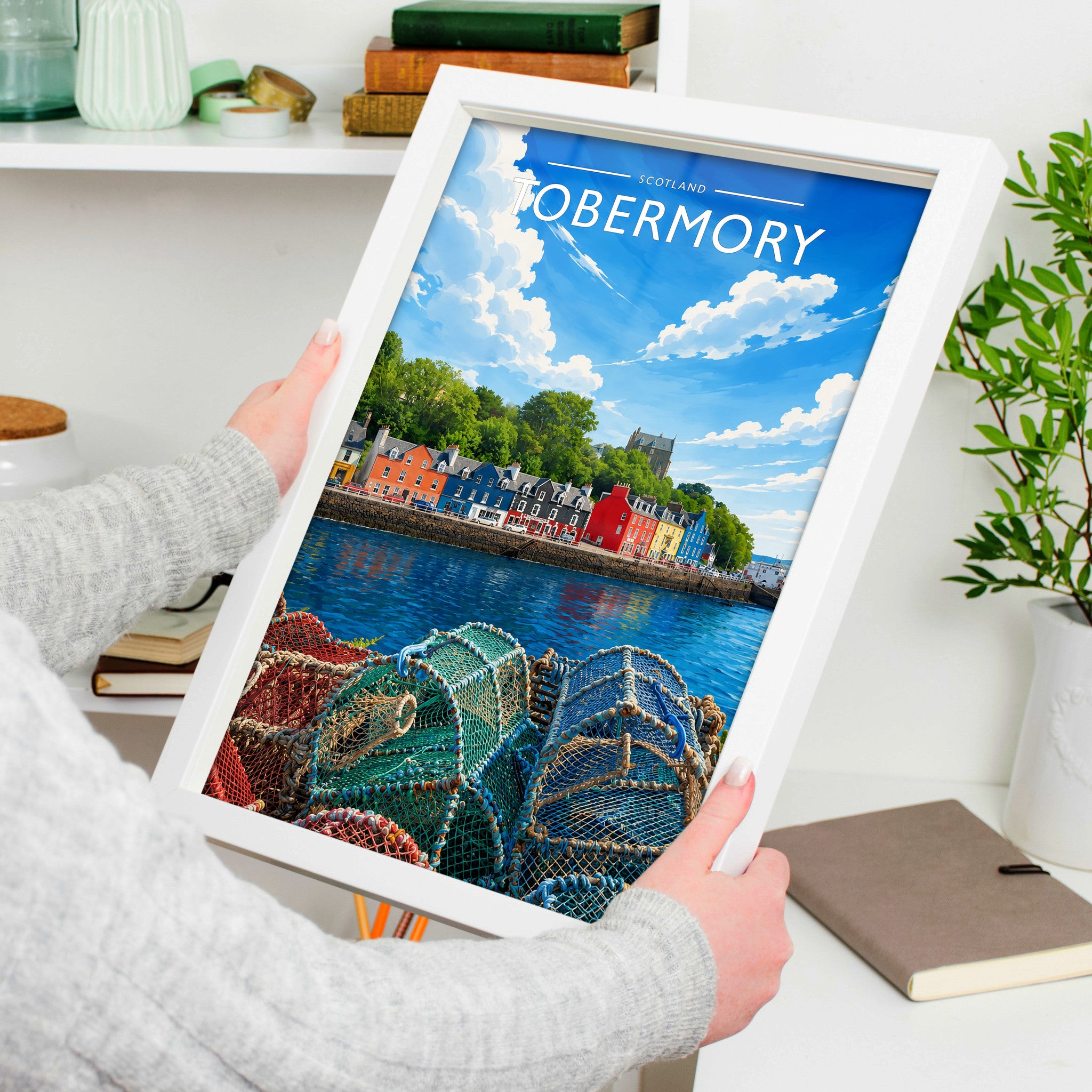 Tobermory #3 Travel Poster in a white frame, held to show scale