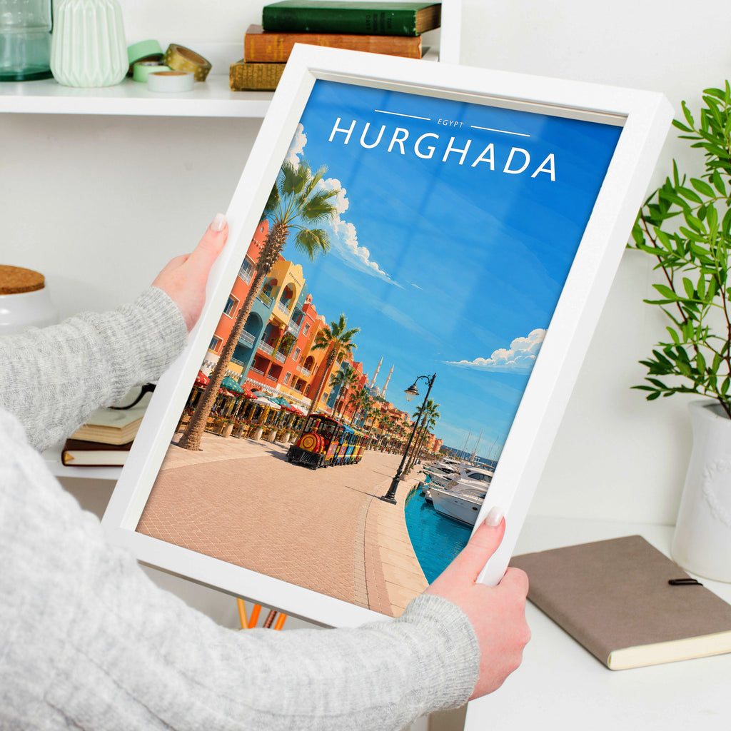 Hurghada Travel Poster in a white frame, held to show scale