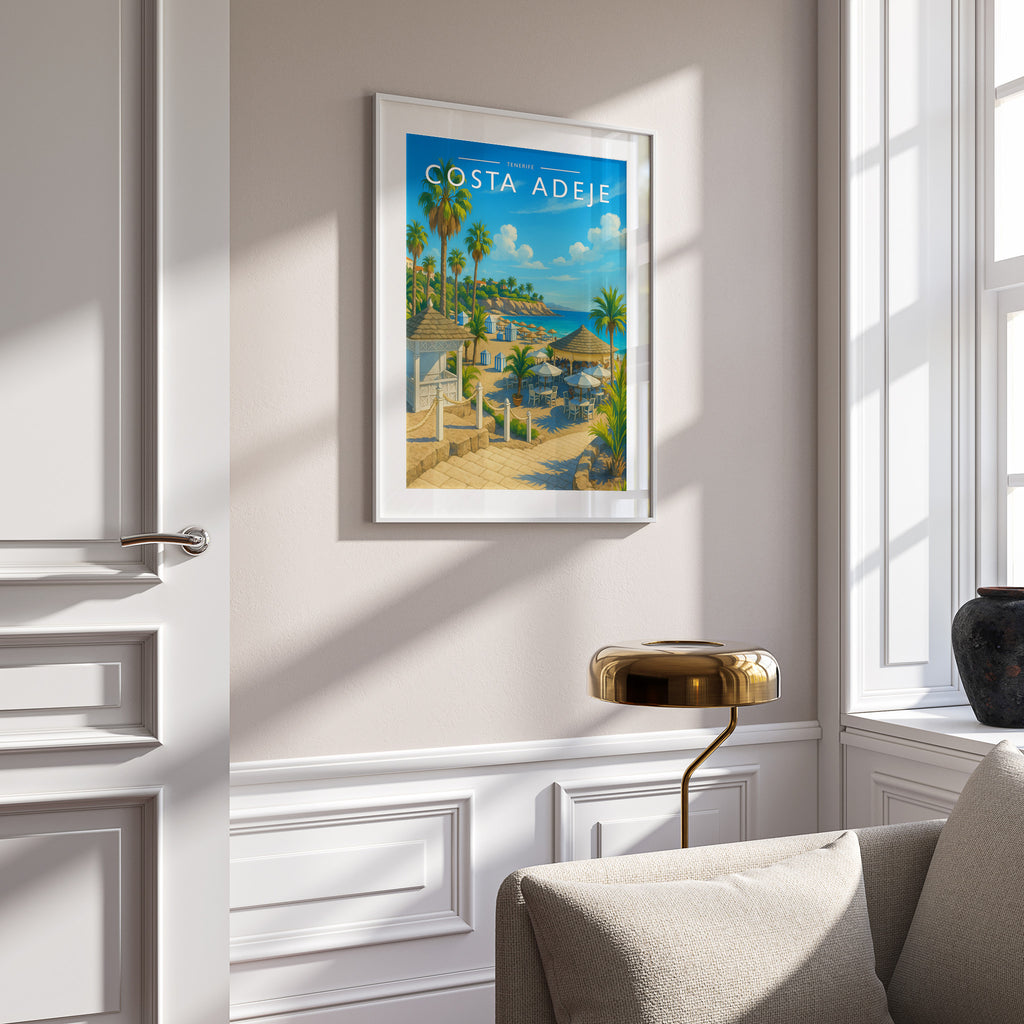 Costa Adeje Travel Poster in a white frame on a panelled wall