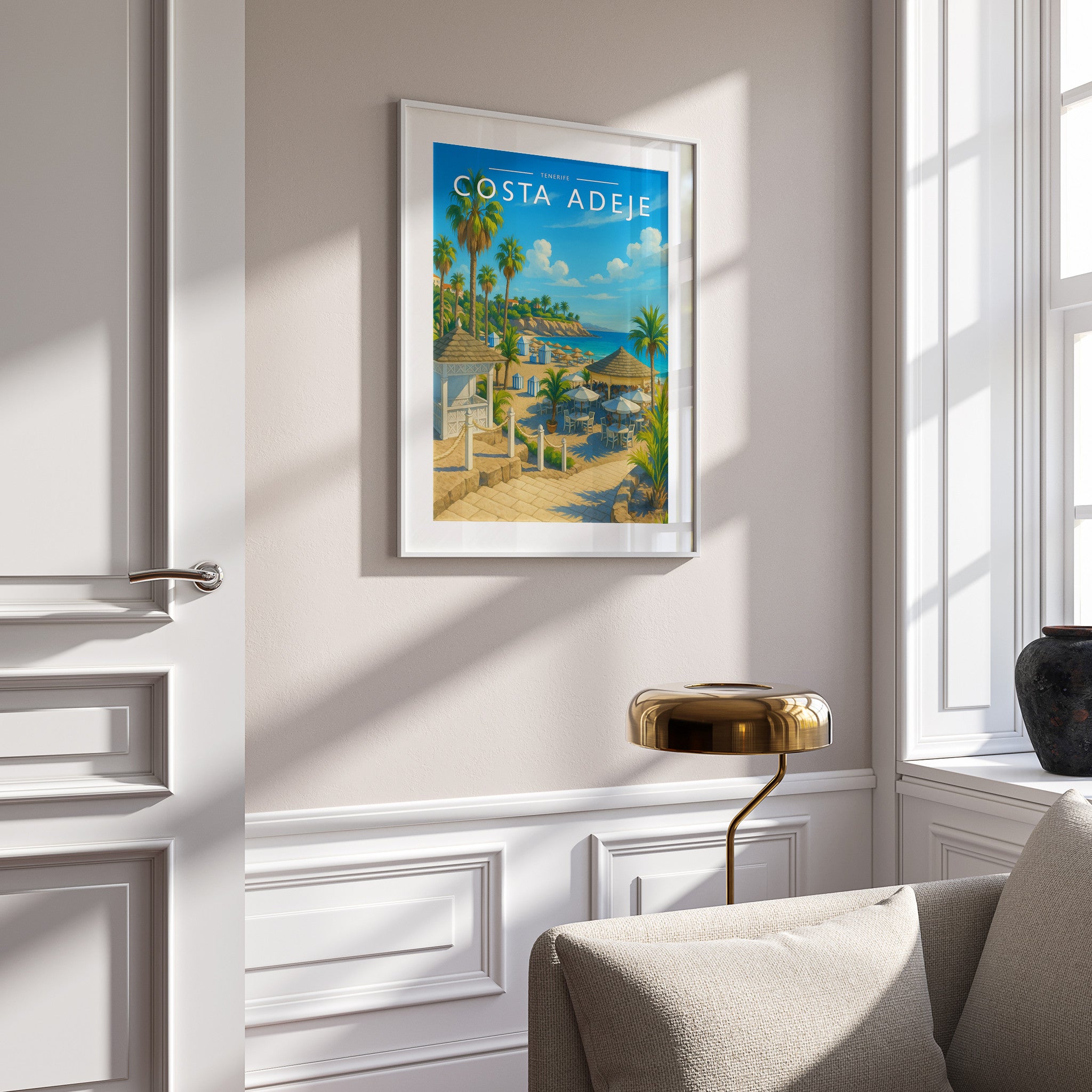 Costa Adeje Travel Poster in a white frame on a panelled wall