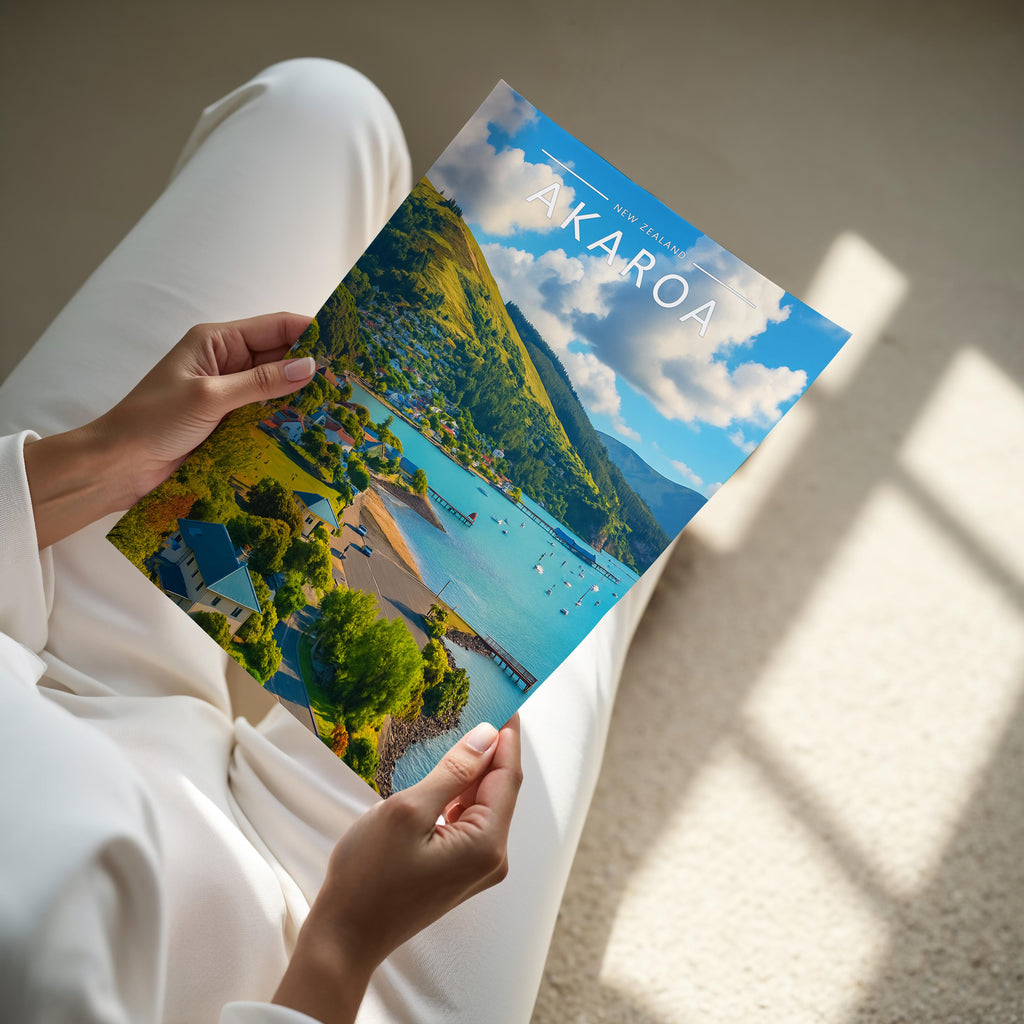 Akaroa Travel Poster - A4 print held in hand