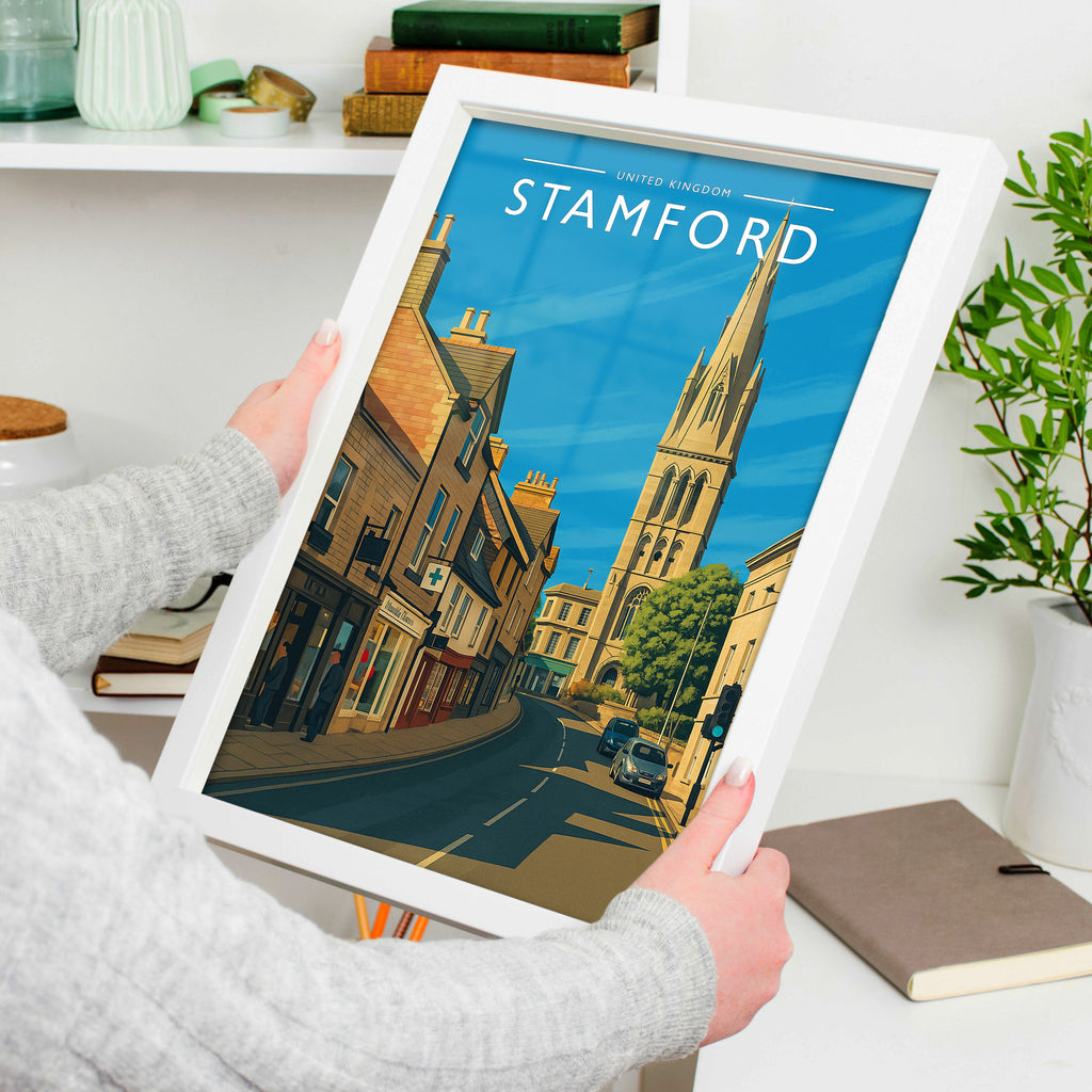 Stamford #3 Travel Poster in a white frame, held to show scale
