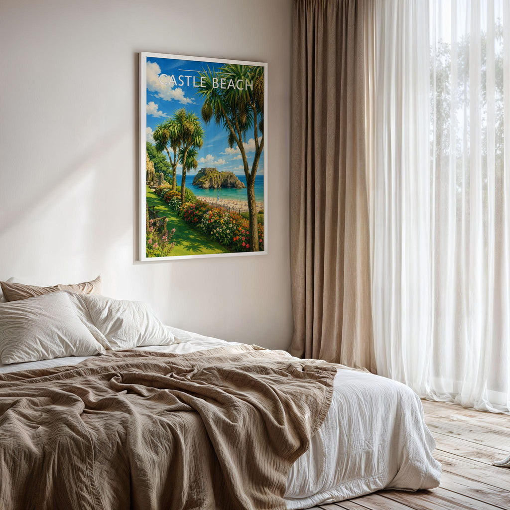 Castle Beach Travel Poster framed on a bedroom wall